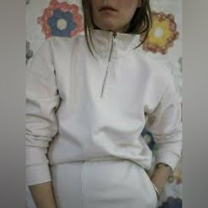 Rudy Jude half zip in natural.